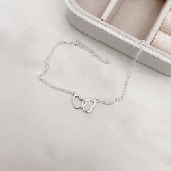 Pulseira entremeio dois corações vazados 16mm