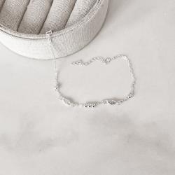 Pulseira entremeio bolas e zircônias navete