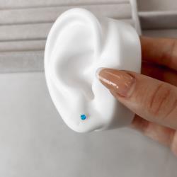 Brinco zircônia redonda azul 3mm garra